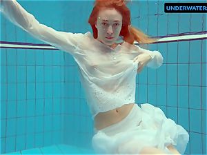 ginger-haired Diana hot and naughty in a milky dress