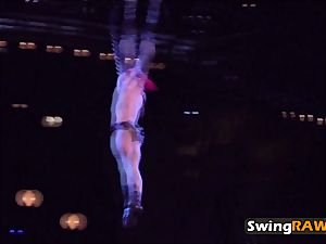 Swingers warmed up with striptease showcase